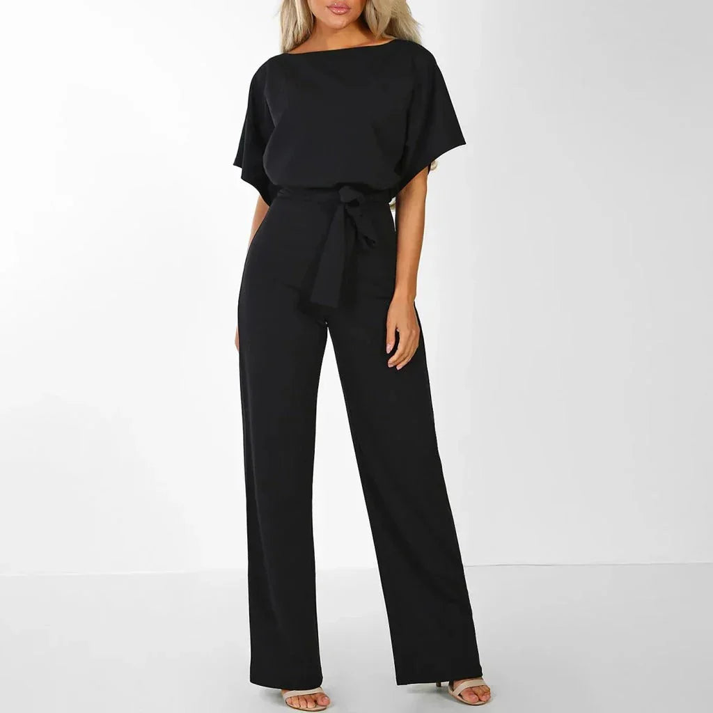 Elegant women's jumpsuit with slim waist & flattering fit, perfect for formal or casual chic spring outfits.
