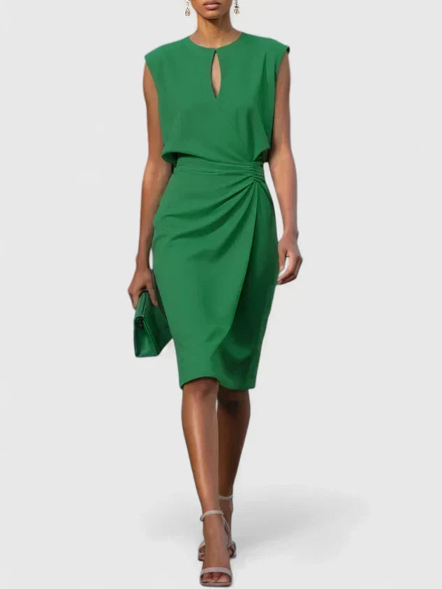 Sophisticated sleeveless midi dress featuring a stylish keyhole neckline and flattering ruched waist.