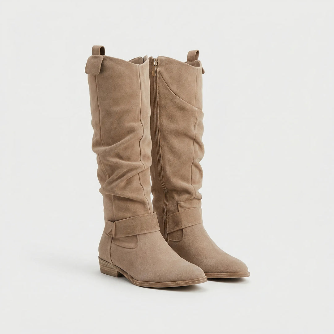 Stylish women's knee-high dress boots. Effortless comfort with a block heel & practical side zipper, perfect for fall trends.