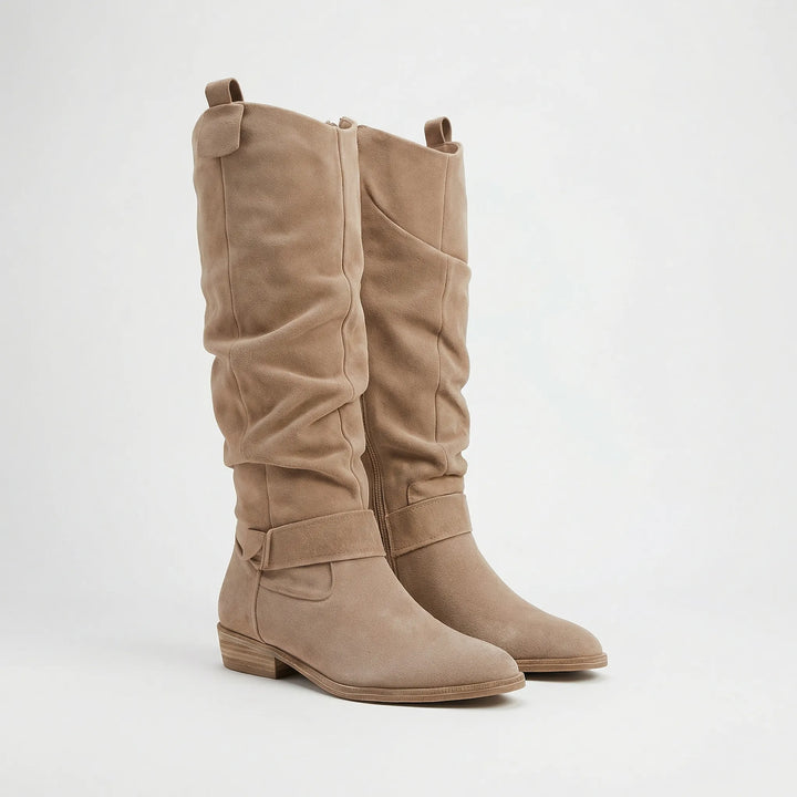 Chic women's knee-high boots for fall. Elegant design, comfortable block heel & easy side zipper for stylish daily wear.