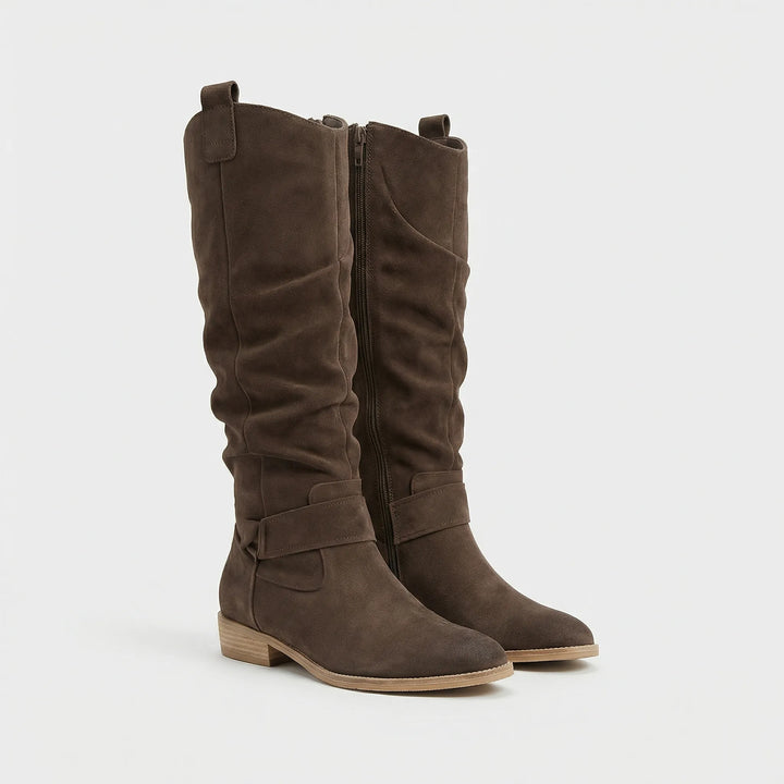 Modern women's knee-high boots. Effortless style, comfortable block heel, & side zipper; ideal elegant footwear for fall.