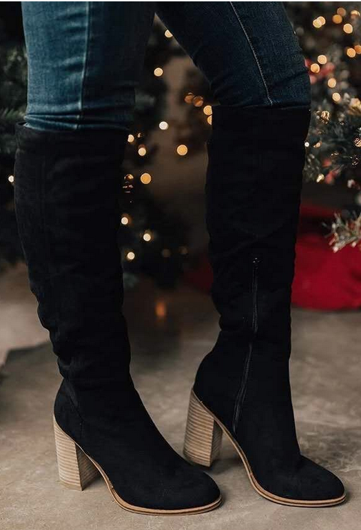 Fashion-forward women's long boots. Elegant knee-high design with a comfortable block heel for versatile fall style.