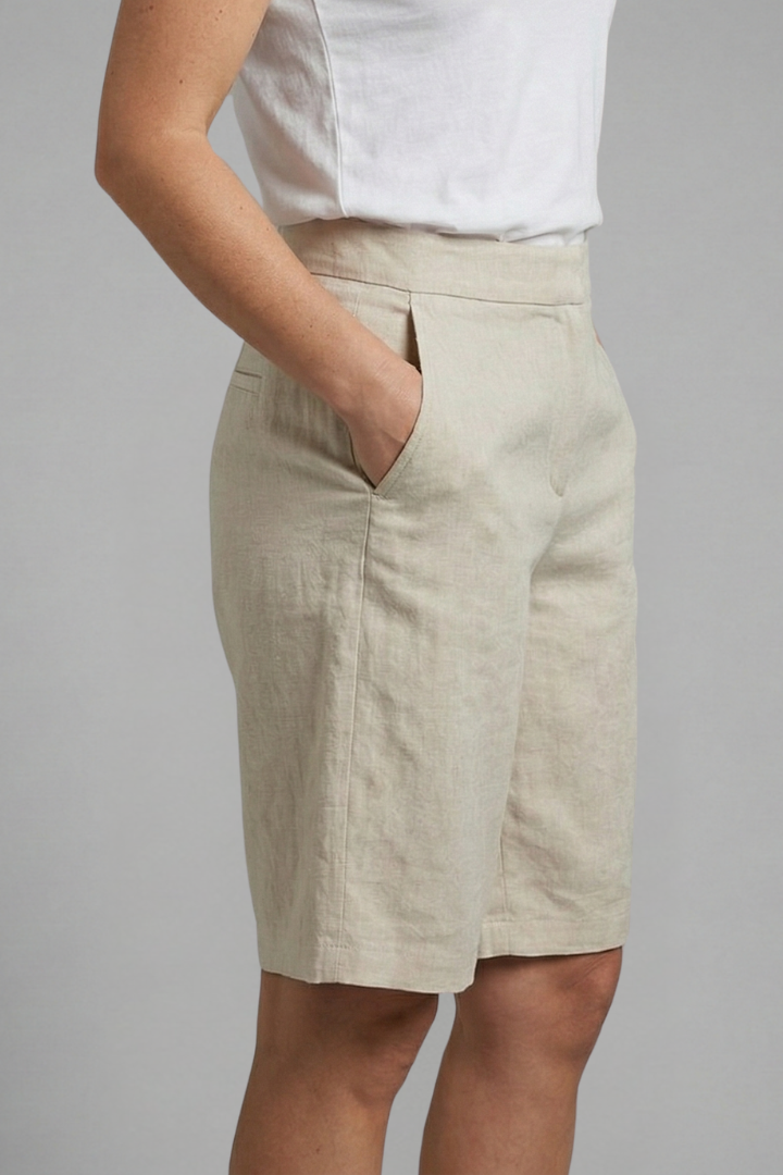 Sophisticated women's tailored shorts, knee-length, with a flat front, great for elegant summer outfits.