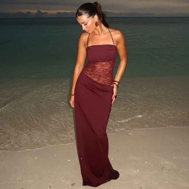 Long elegant women's maxi dress with sophisticated lace detailing, suitable for formal occasions.