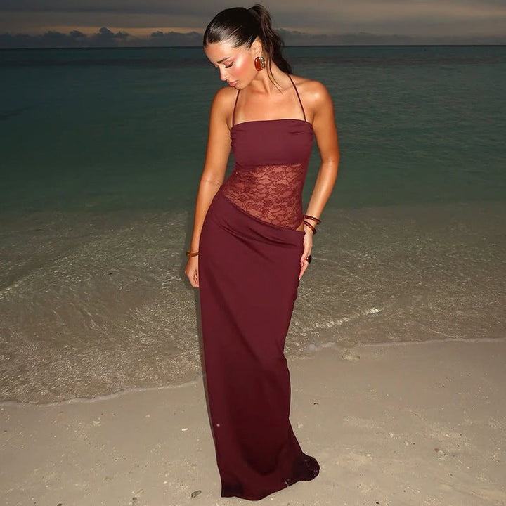 Long elegant women's maxi dress with sophisticated lace detailing, suitable for formal occasions.
