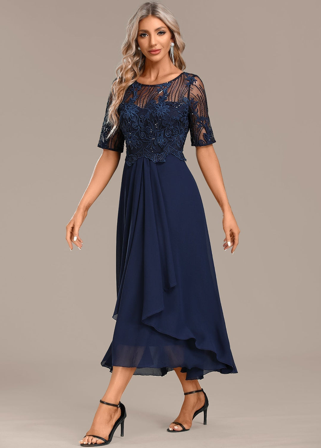 Women's sophisticated short sleeve lace midi dress, ideal for party wear & special occasions. Flattering fit.