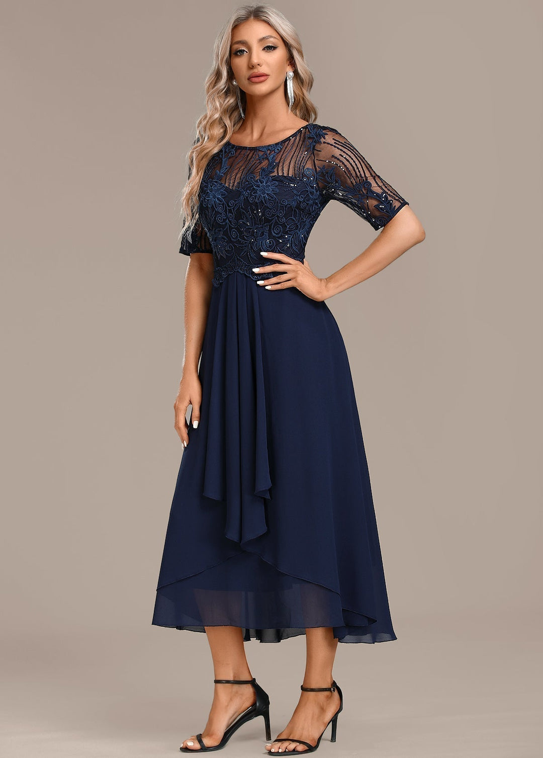 Versatile women's elegant lace midi dress with short sleeves, suitable for parties, occasion wear or casual chic.