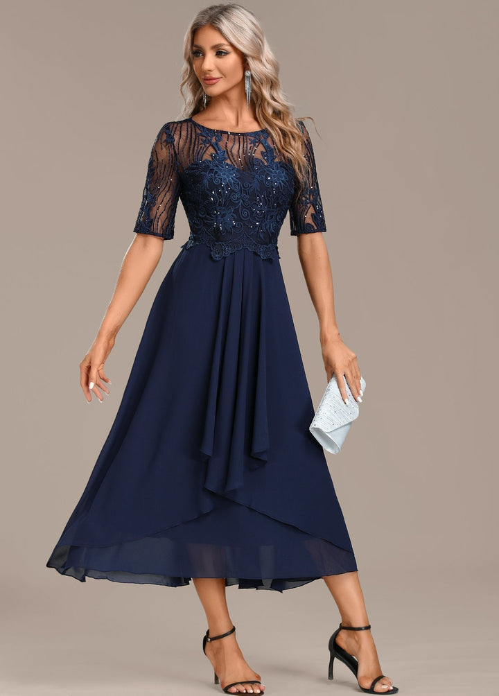 Stylish women's midi dress featuring elegant lace, short sleeves, and a flattering cut for any sophisticated event.