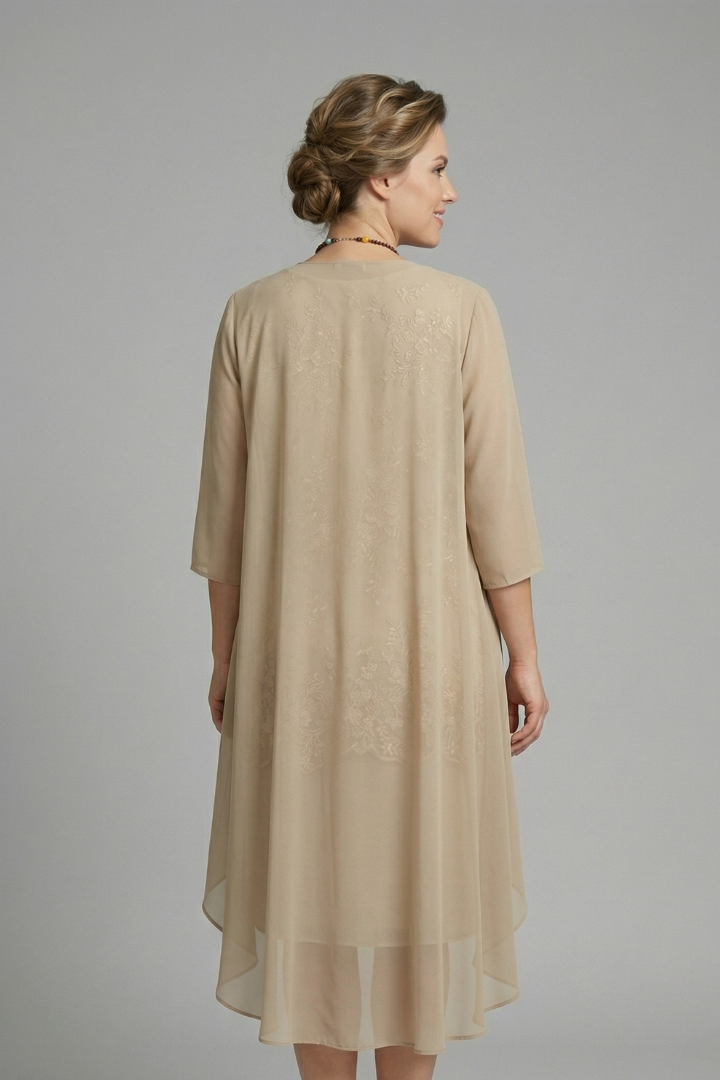 Lightweight women's summer dress: layered sheer overlay, round neck, short sleeves, flared knee-length, comfortable & stylish.