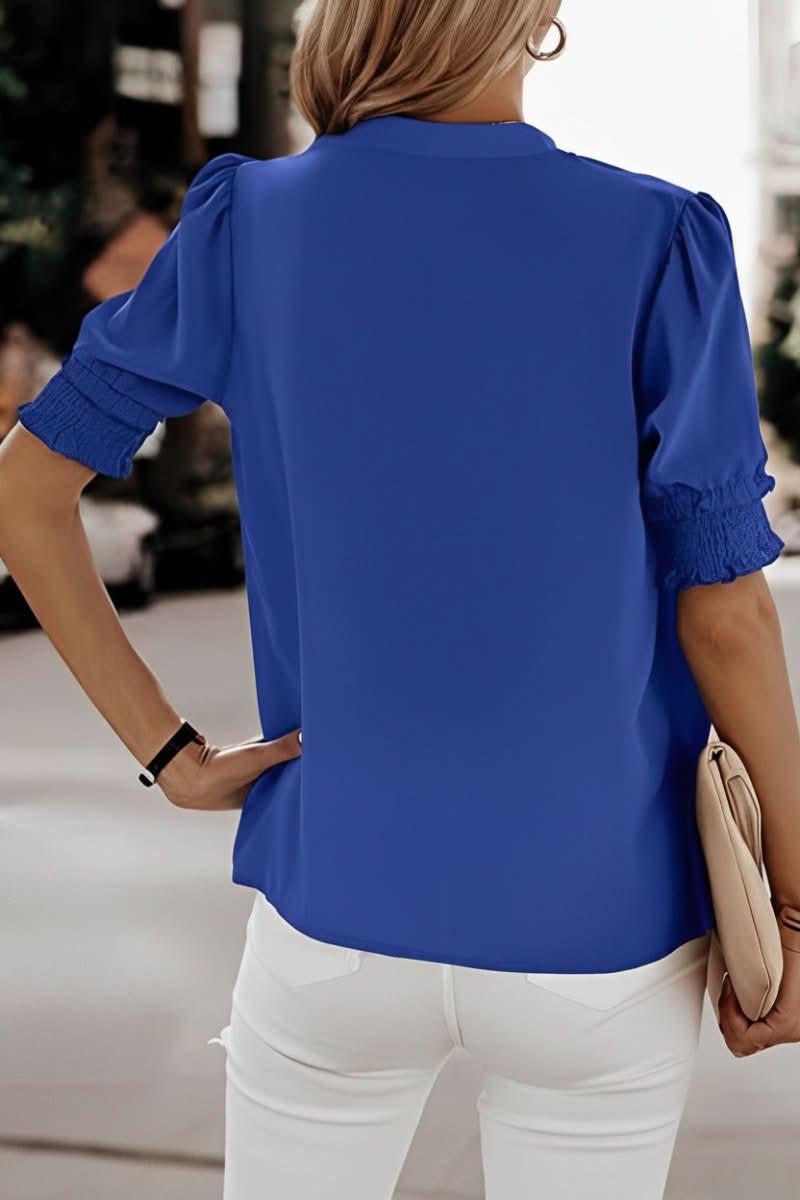 Lightweight V-neck puff sleeve top for women, perfect for summer fashion, offering effortless style and comfort.