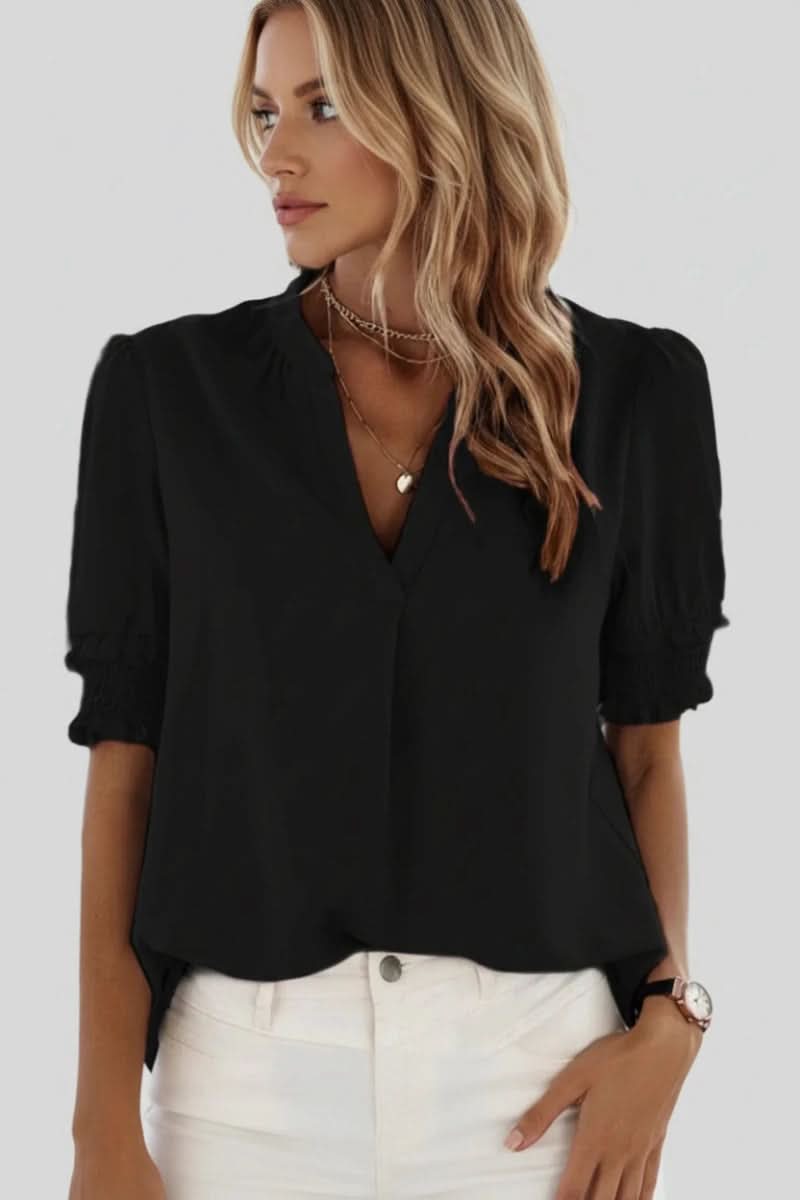 Stylish women's puff sleeve V-neck top, a lightweight and elegant blouse for modern summer fashion.