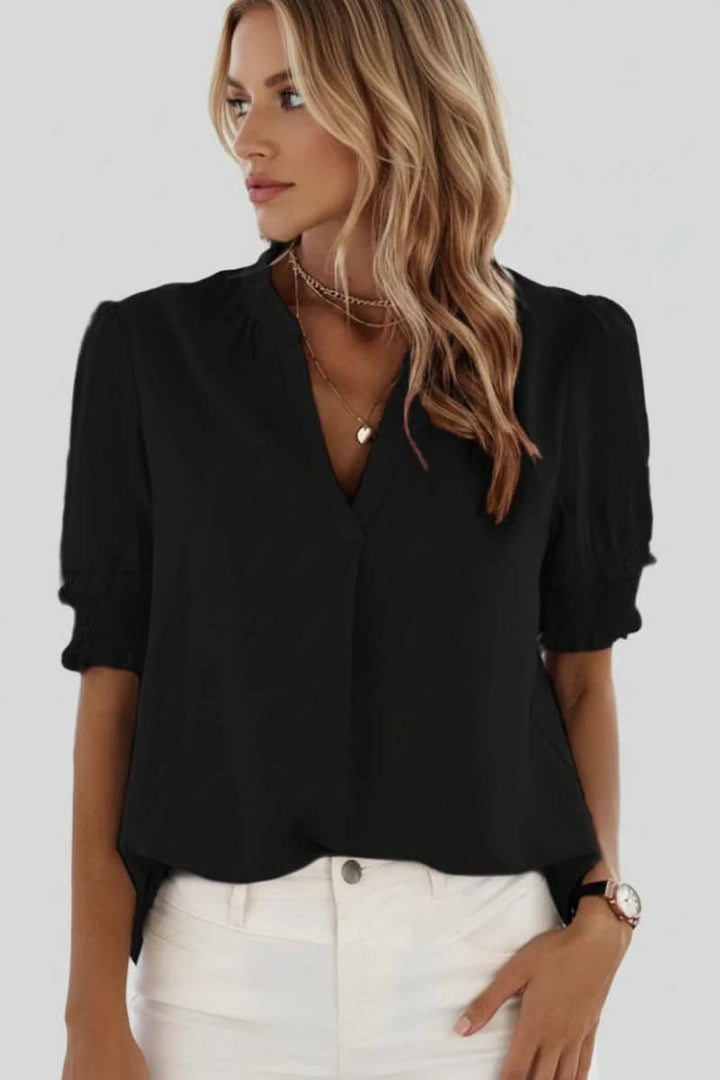 Stylish women's puff sleeve V-neck top, a lightweight and elegant blouse for modern summer fashion.
