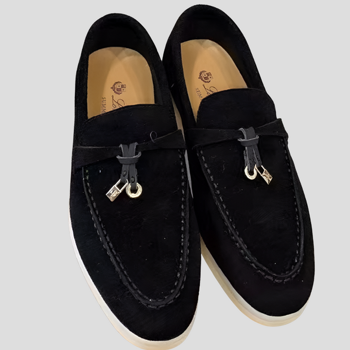 Comfortable women's tassel loafers, ideal for casual wear or dressy occasions. Stylish slip-on footwear.