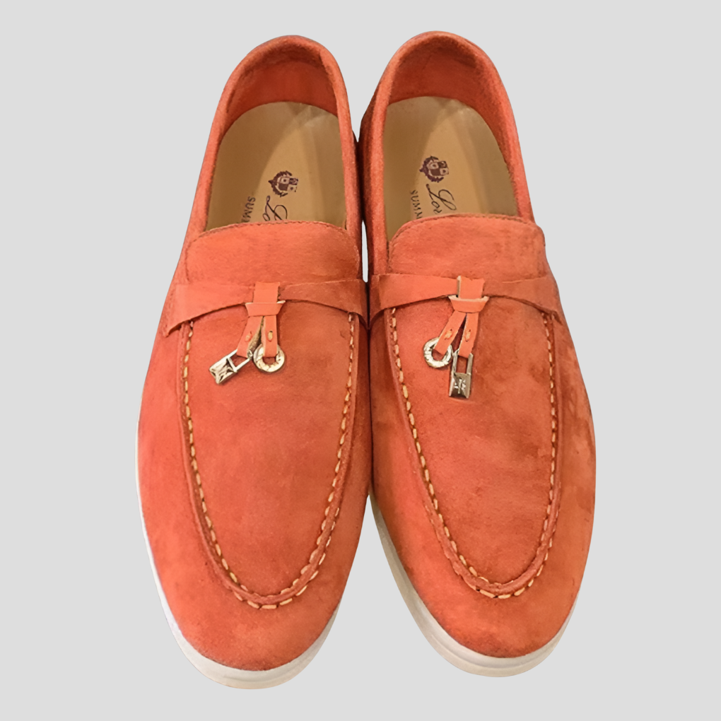 Chic women's loafers with intricate tassel details, offering comfortable and elegant everyday wear.
