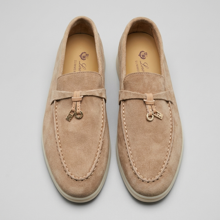 Dressy casual women's loafers with elegant tassel detail. Sophisticated slip-on flats for work or leisure.