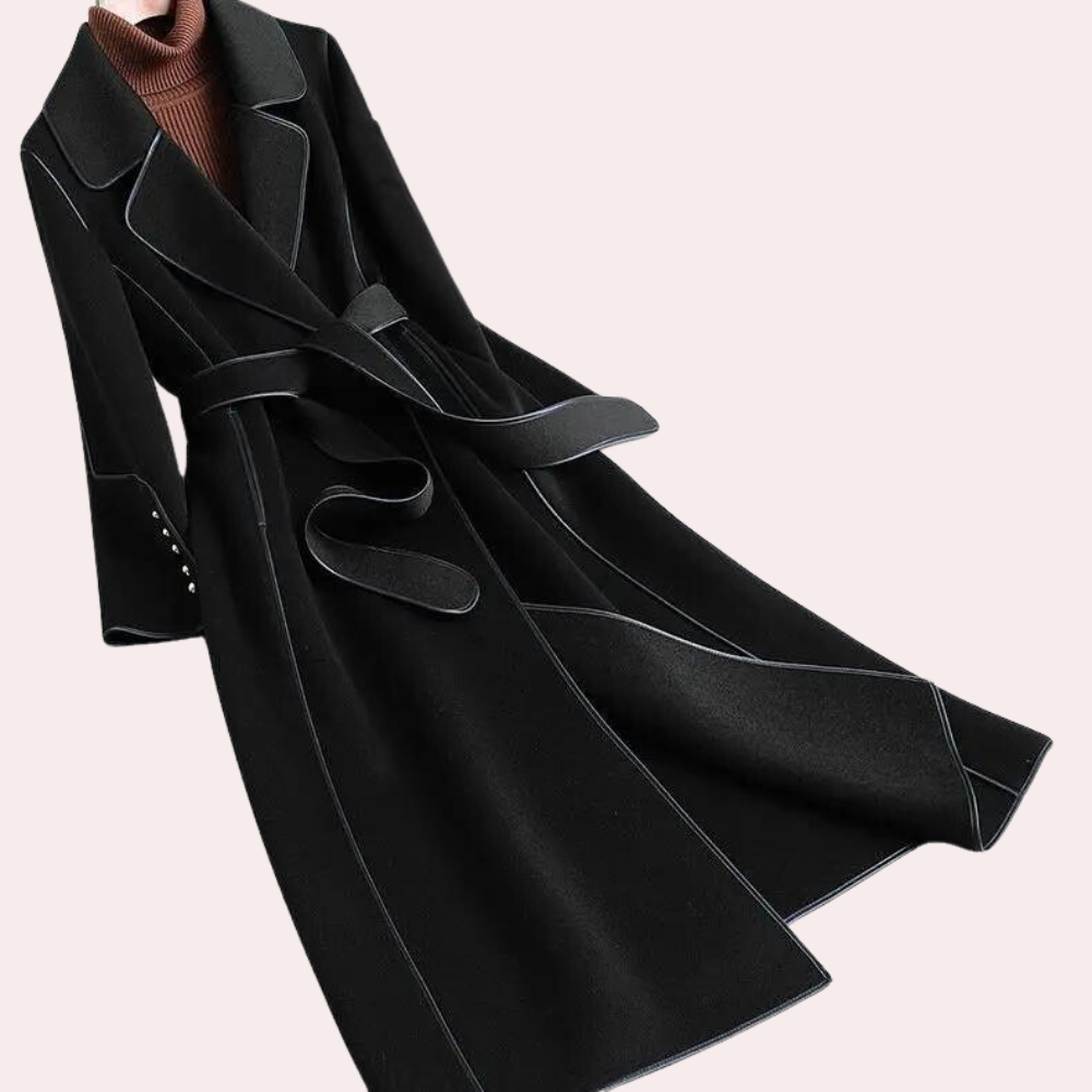 Elegant women's long coat, double-buttoned with a belted waist. Ideal for chic fall and winter fashion.