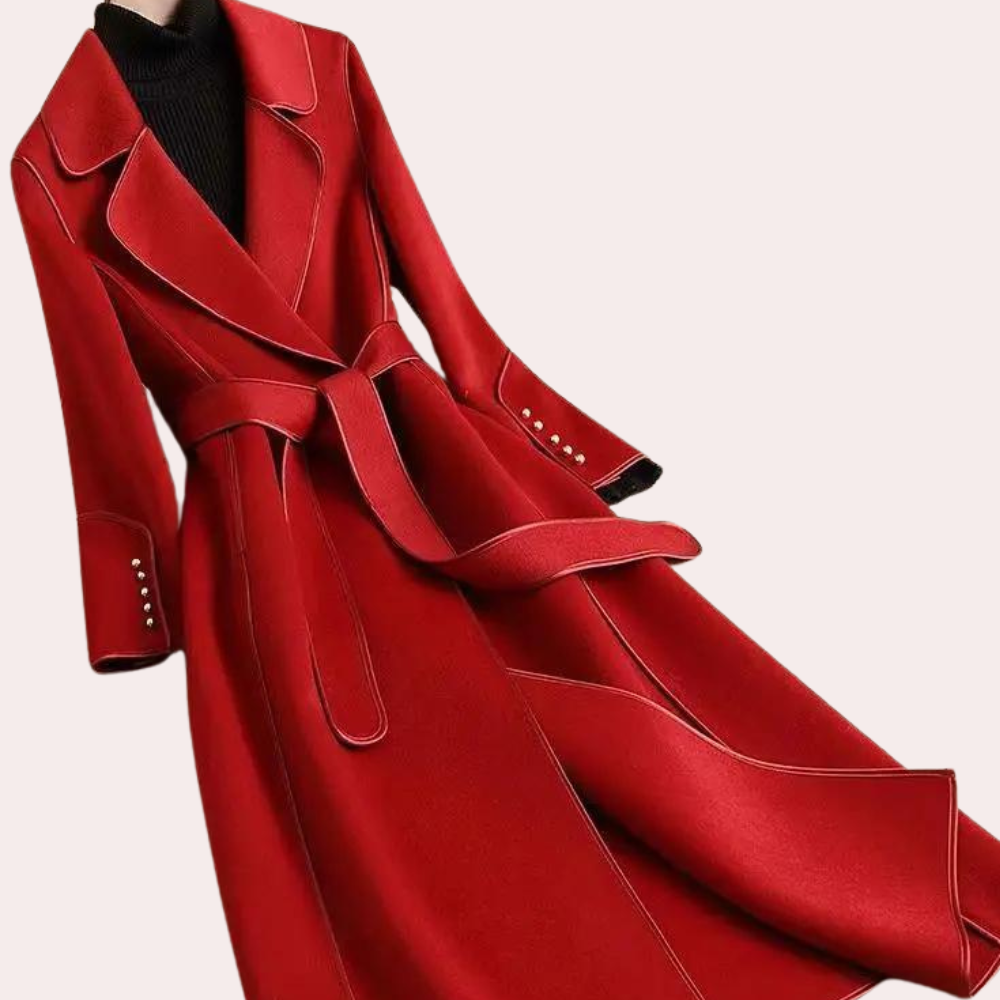 Sophisticated women's long coat with double buttons and a belted waist. Perfect elegant fall/winter outerwear.