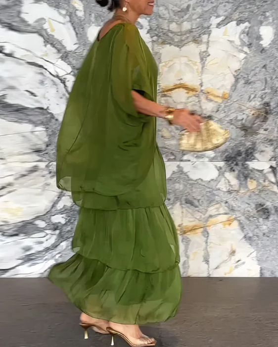 Graceful women's elegant long flowing maxi dress, a chic choice for sophisticated ladies & summer fashion.