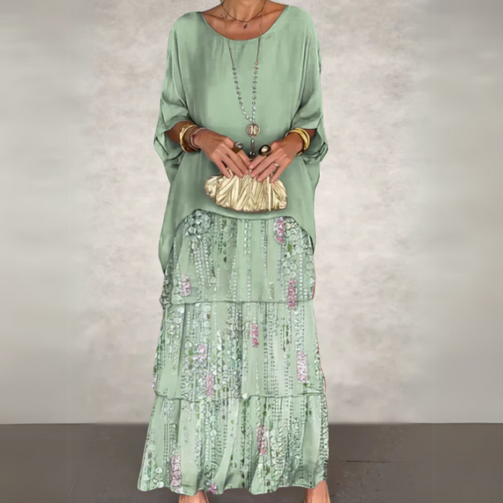 Close-up of the soft, flowing fabric of an elegant women's maxi dress, highlighting quality & comfort.