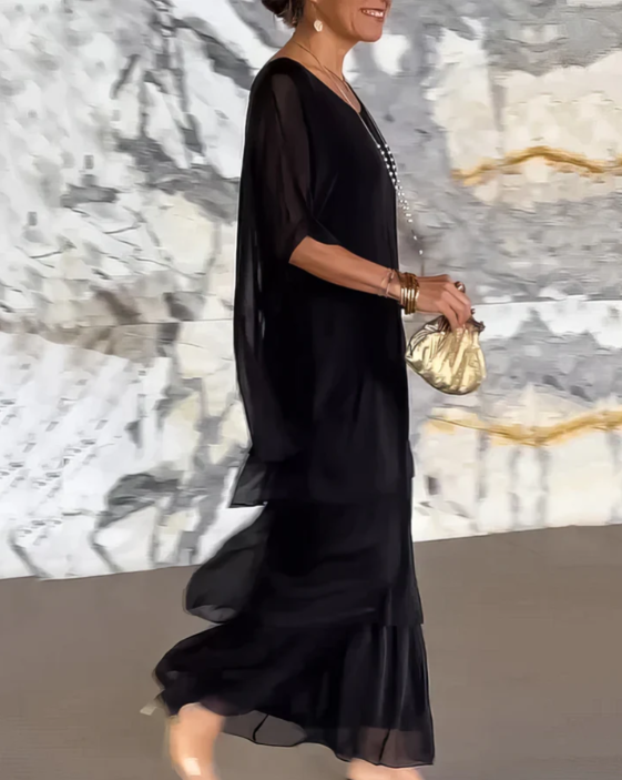 Stylish woman wearing a comfortable flowing maxi dress, perfect for a summer day or evening wear.
