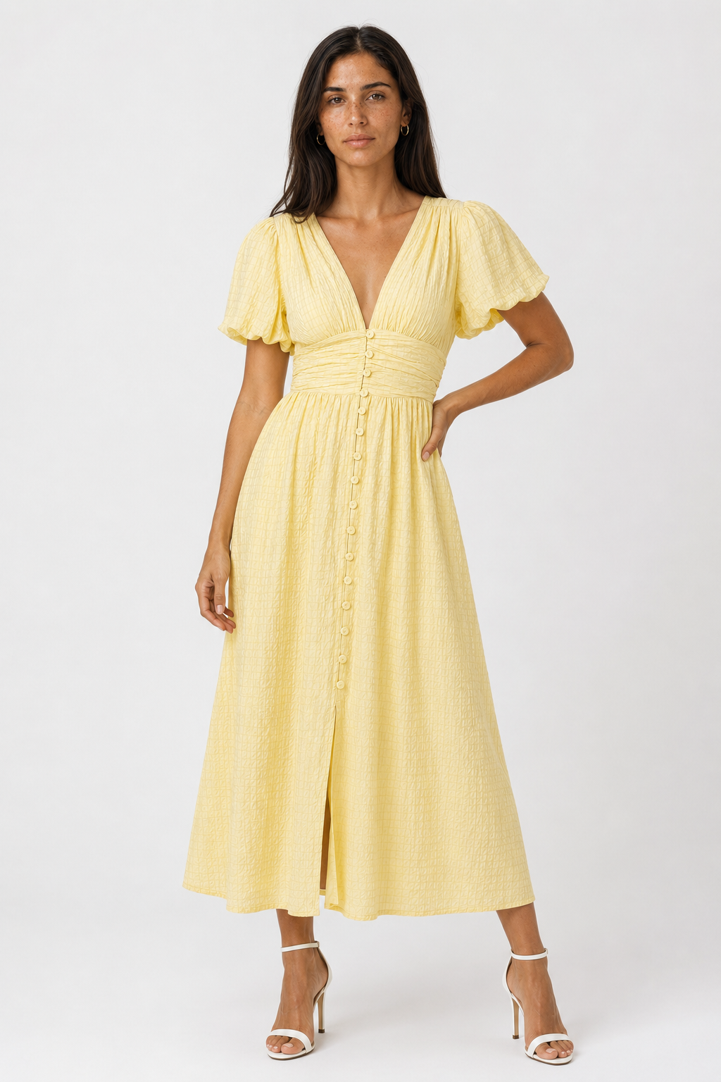 Flowy elegant maxi dress for women, featuring romantic puff sleeves. Ideal party or occasion wear.