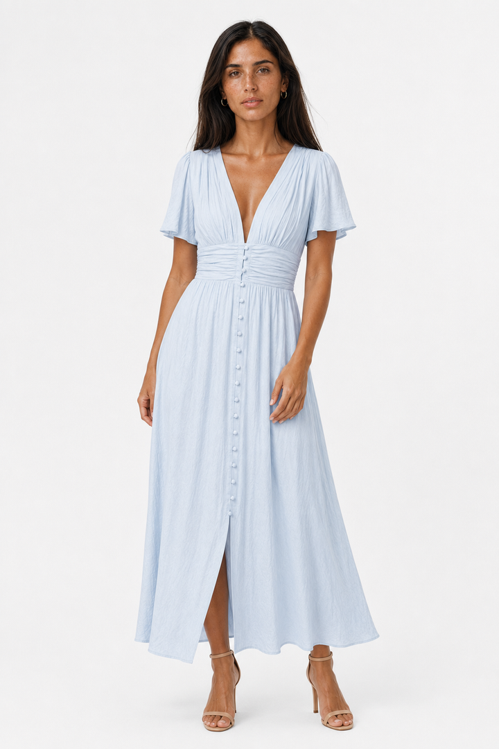 Comfortable women's elegant long summer maxi dress. Features fashionable puff sleeves for a chic look.