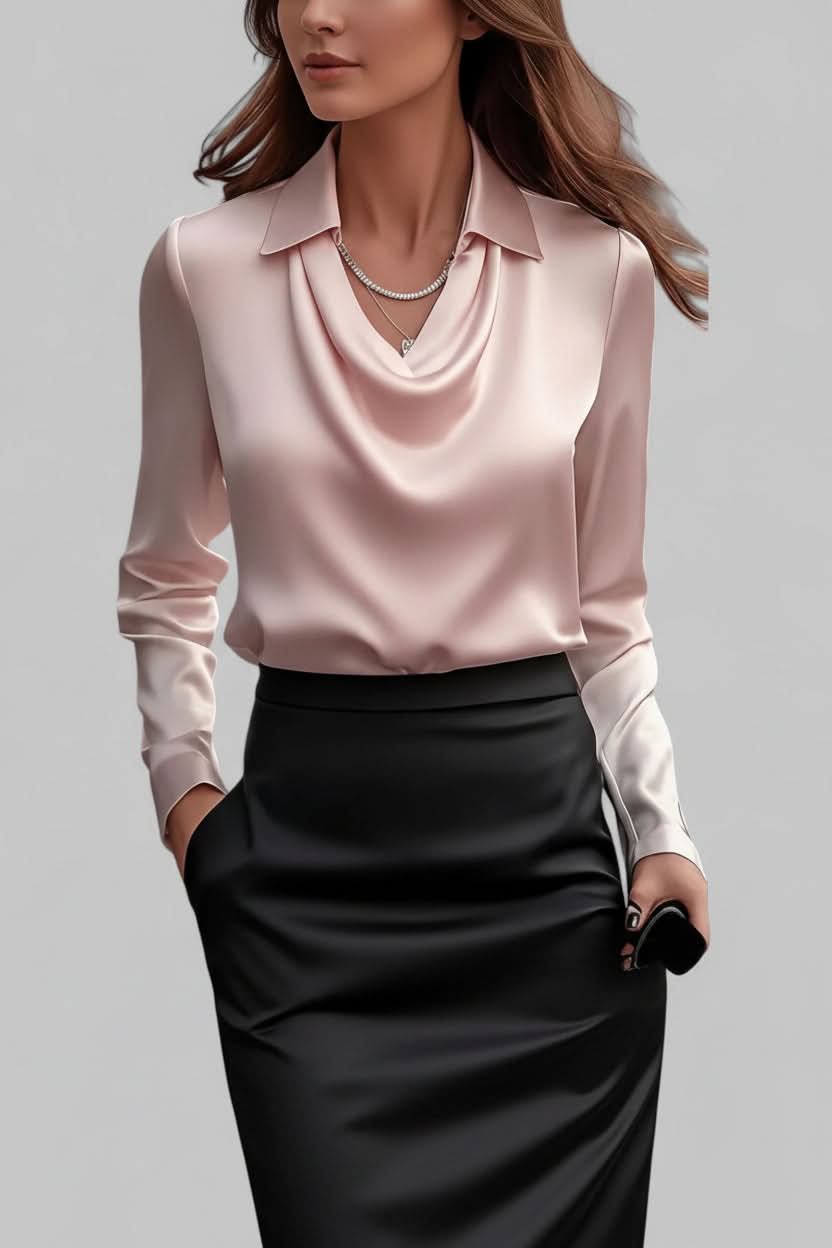 Stylish women's blouse with elegant draping and long sleeves, ideal for versatile office outfits.