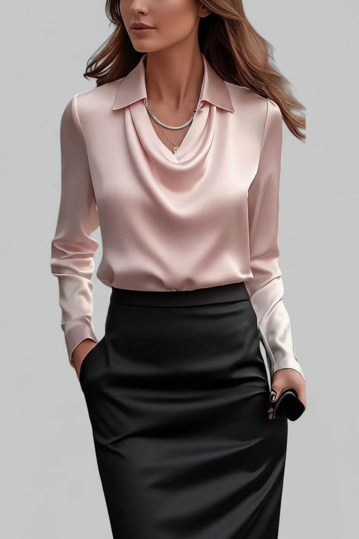 Stylish women's blouse with elegant draping and long sleeves, ideal for versatile office outfits.