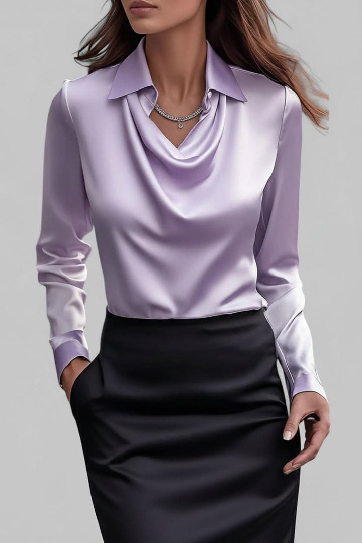 Professional women's elegant long sleeve blouse, a chic draped top suitable for any event.