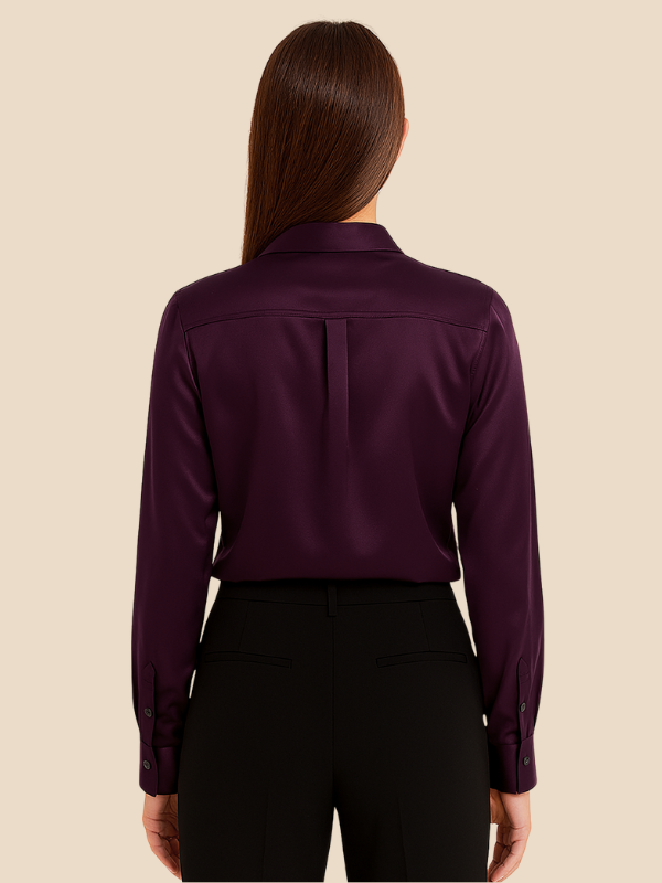 Collared women's long sleeve button blouse, enhancing professional and casual outfits.