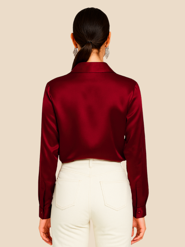 Front view of elegant women's long sleeve button blouse for office & casual wear.