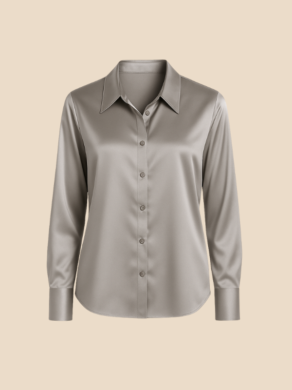 Detail of collar on an elegant women's long sleeve button-up blouse.