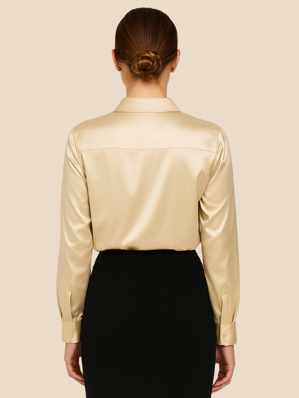 Women's long sleeve button blouse with cuffed sleeves, a chic detail.