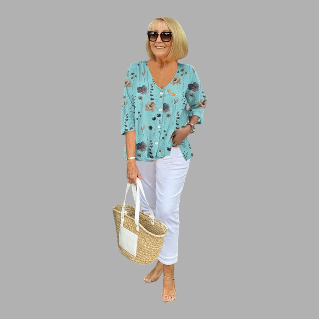 Elegant women's long sleeve floral blouse, perfect for semi-formal events or sophisticated office attire.