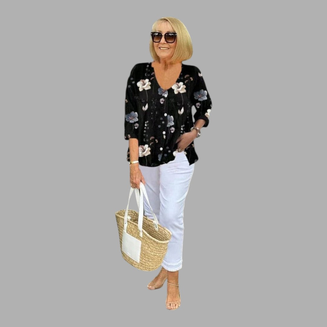 Chic women's floral blouse, elegant long sleeve top for refined style, comfortable and versatile.