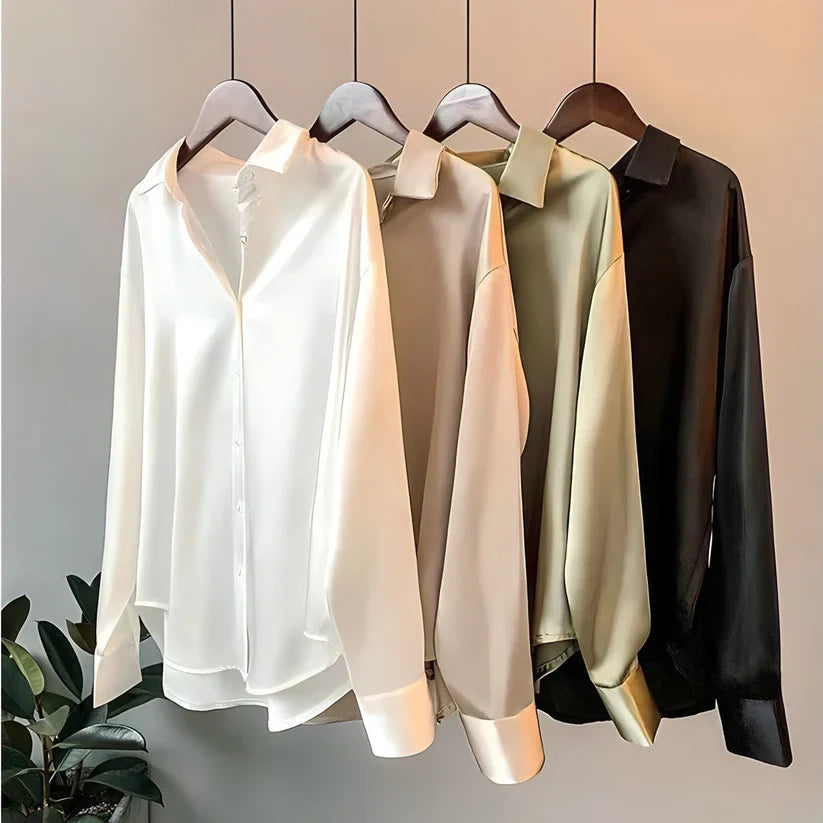 Loose fit long sleeve women's blouse, versatile for office wear or casual chic. Elegant fashion top for women.