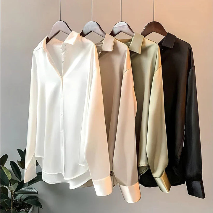 Loose fit long sleeve women's blouse, versatile for office wear or casual chic. Elegant fashion top for women.