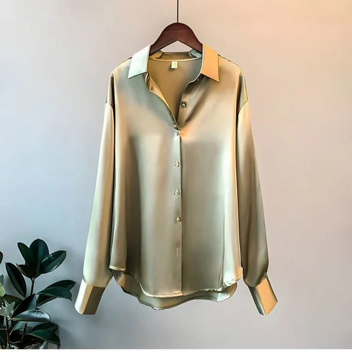 Women's elegant long sleeve loose blouse. A versatile office fashion top, essential women's apparel.