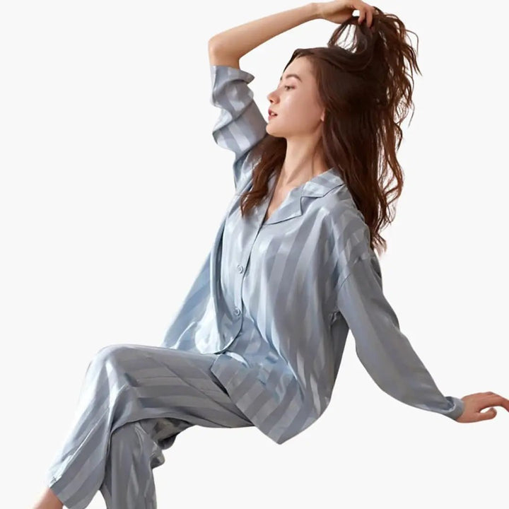 Comfortable women's long sleeve sleepwear set. Elegant two-piece pajamas for a relaxed night or lounge wear.