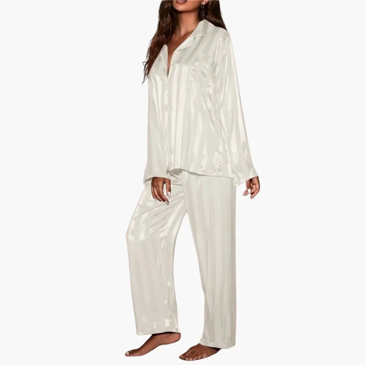 Women's elegant long sleeve pajama set for comfortable sleepwear. Relaxed fit two-piece lounge wear for home.