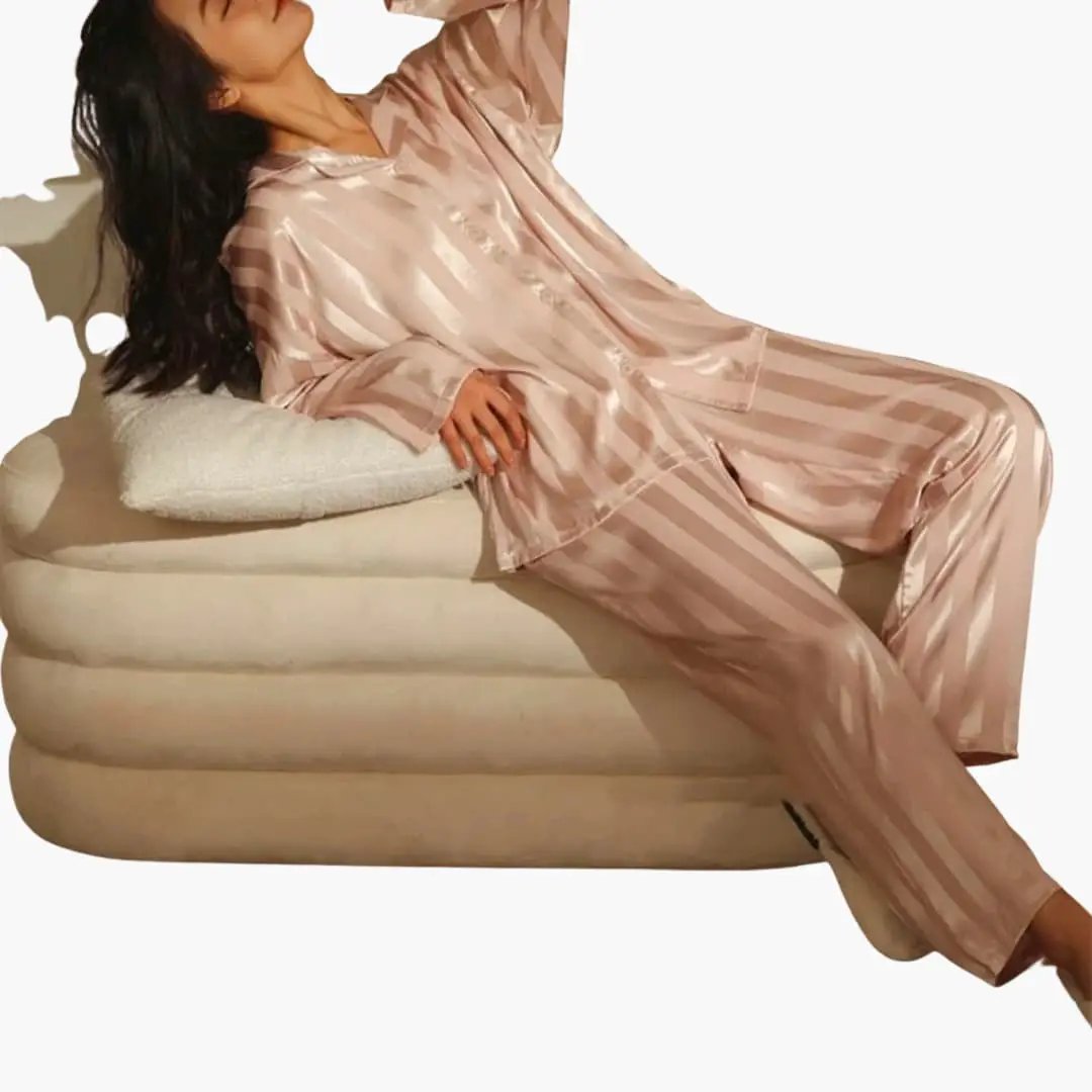 Soft & elegant women's long sleeve pajama set. Comfortable two-piece lounge wear, ideal for relaxed home evenings.