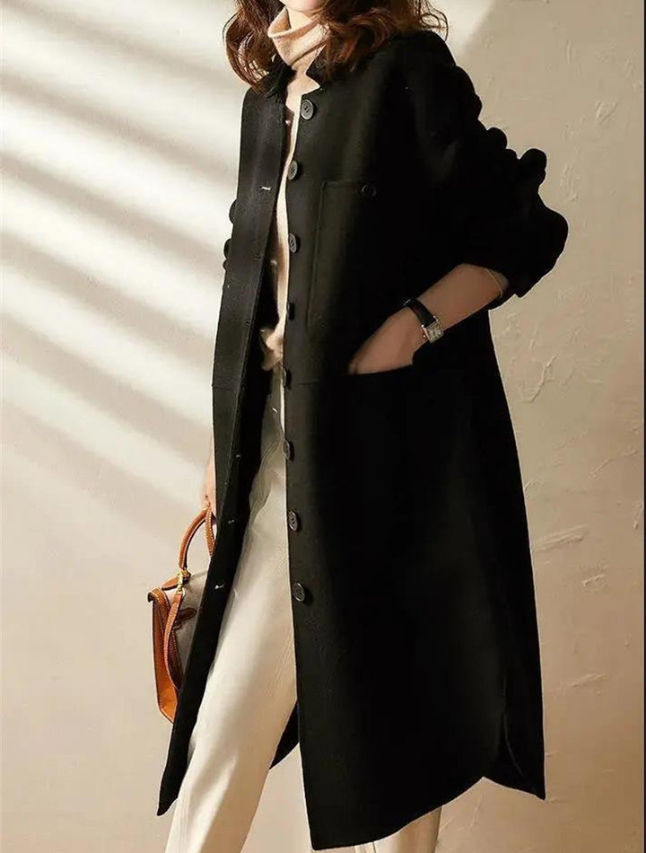 Elegant women's long tailored trench coat, versatile outerwear for sophisticated fall and winter style.