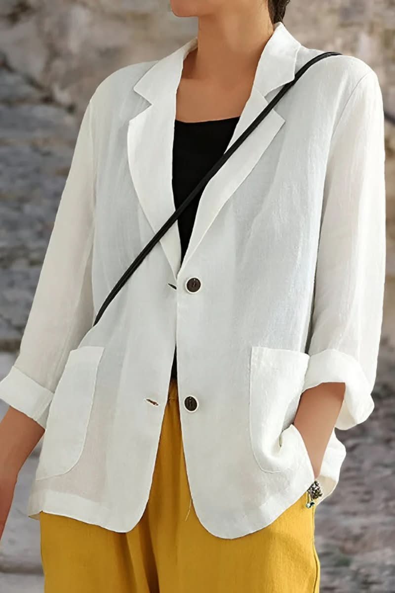 Elegant Women's Luxe Open Back Blazer in tailored fit, perfect for sophisticated professional or chic day-to-night wear.