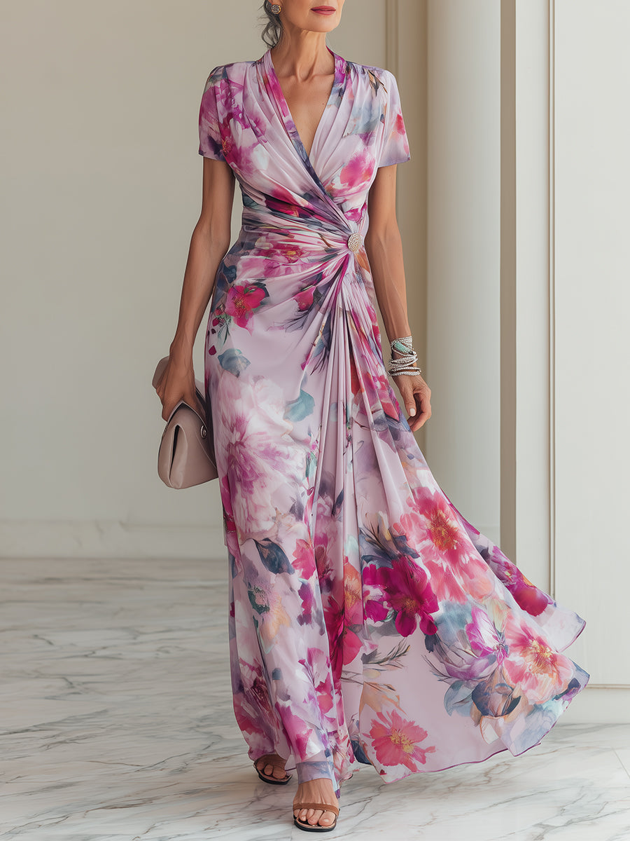 Elegant women's magenta floral wrap maxi dress with V-neck and ruched waist, perfect for wedding guests.