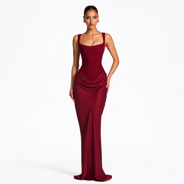 Chic women's long dress with a structured corset bodice and comfortable wide straps, a stunning party choice.