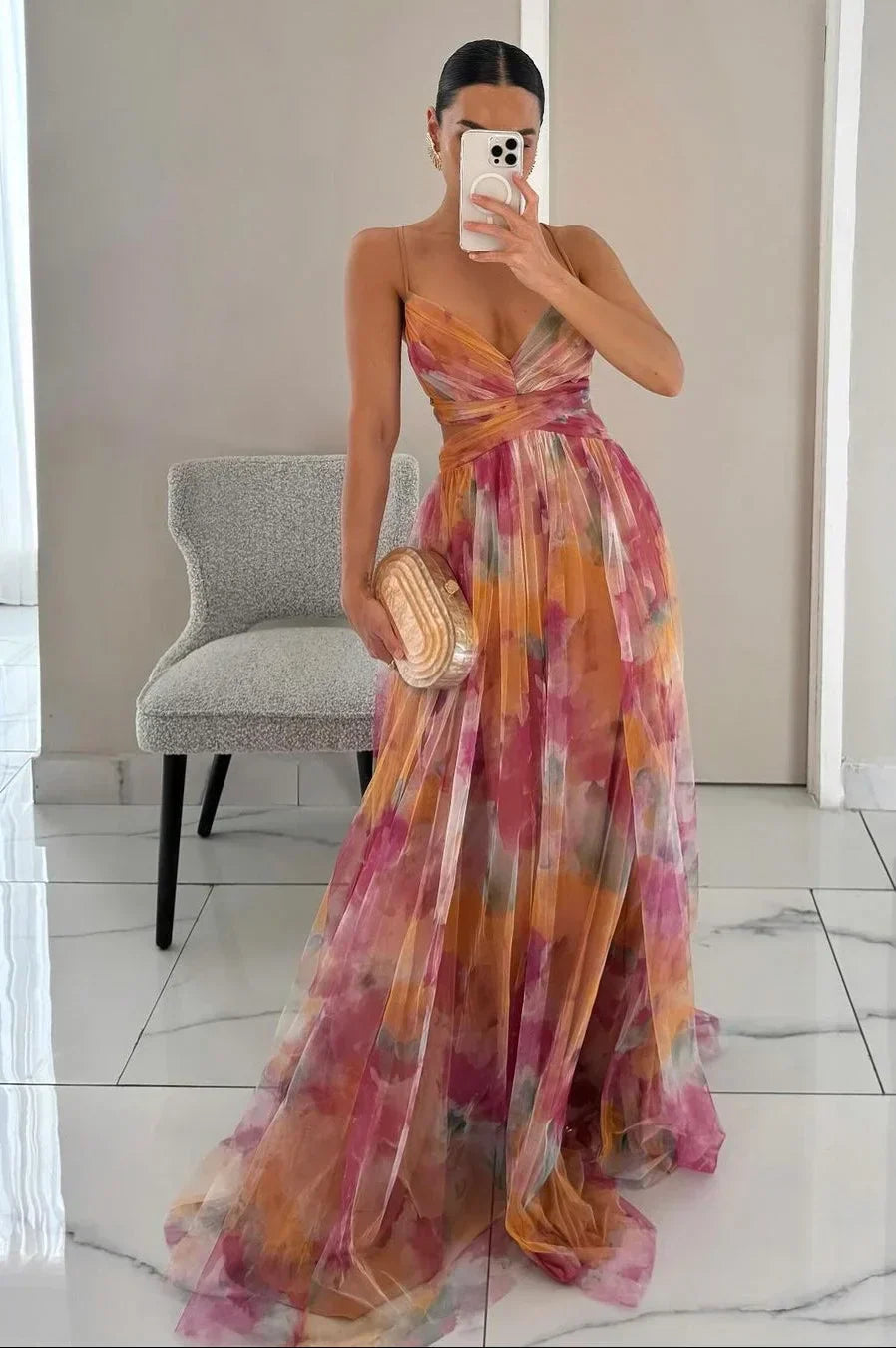 Elegant women's maxi dress with flowy textured layers, perfect for summer occasions and vacations.