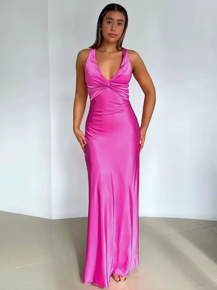 Elegant women's party maxi dress, featuring a halter neck and open back, great for evening wear.