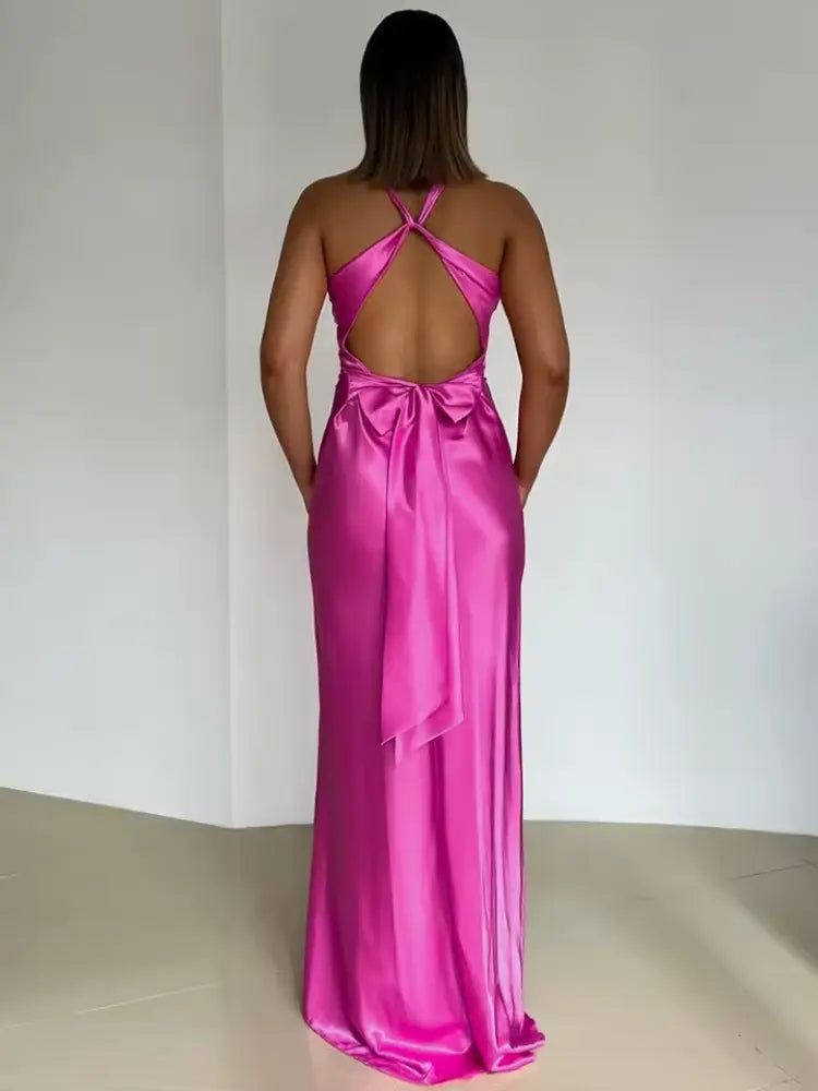 Stylish women's elegant maxi dress, a formal halter neck with open back detail for occasions.