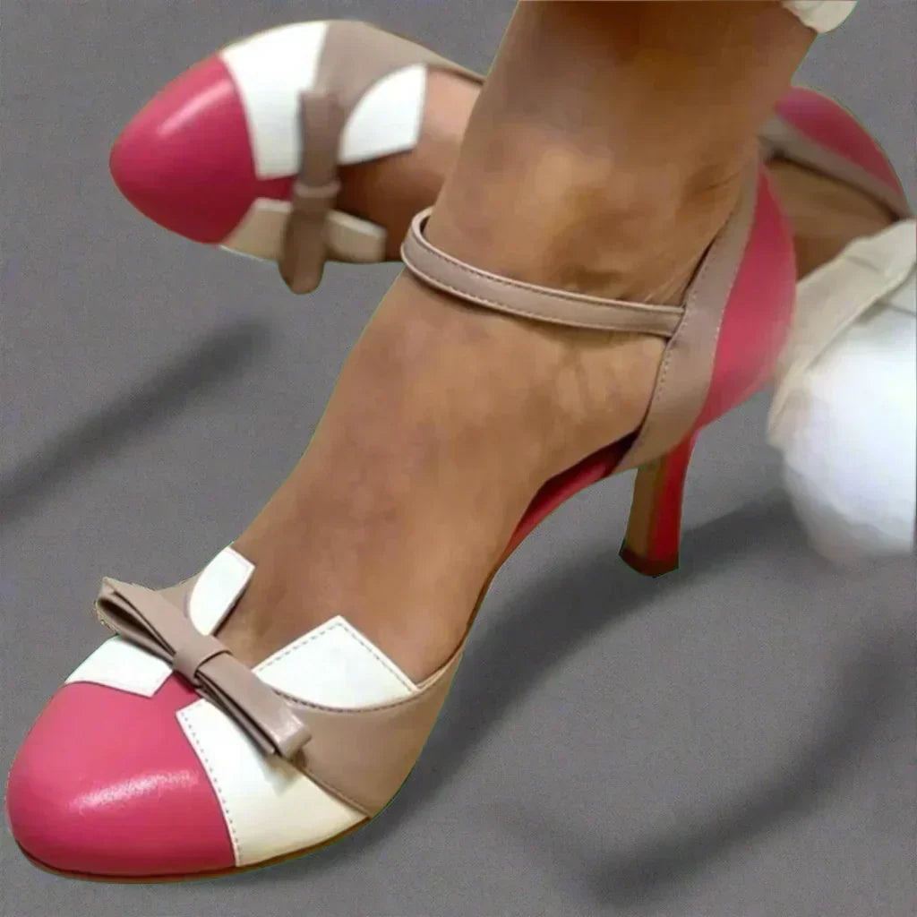Classic women's mid heel pumps. Stylish bow strap dress shoes for elegant comfort, ideal for parties & professional wear.