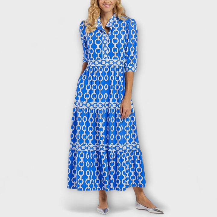 Statement women's elegant midi dress. Features a stunning chain pattern, perfect for versatile summer outfits.